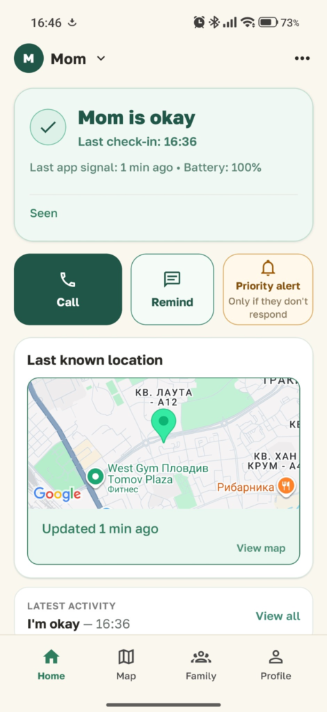 The KinStatus family dashboard showing an OK status with last check-in time, battery and last known location